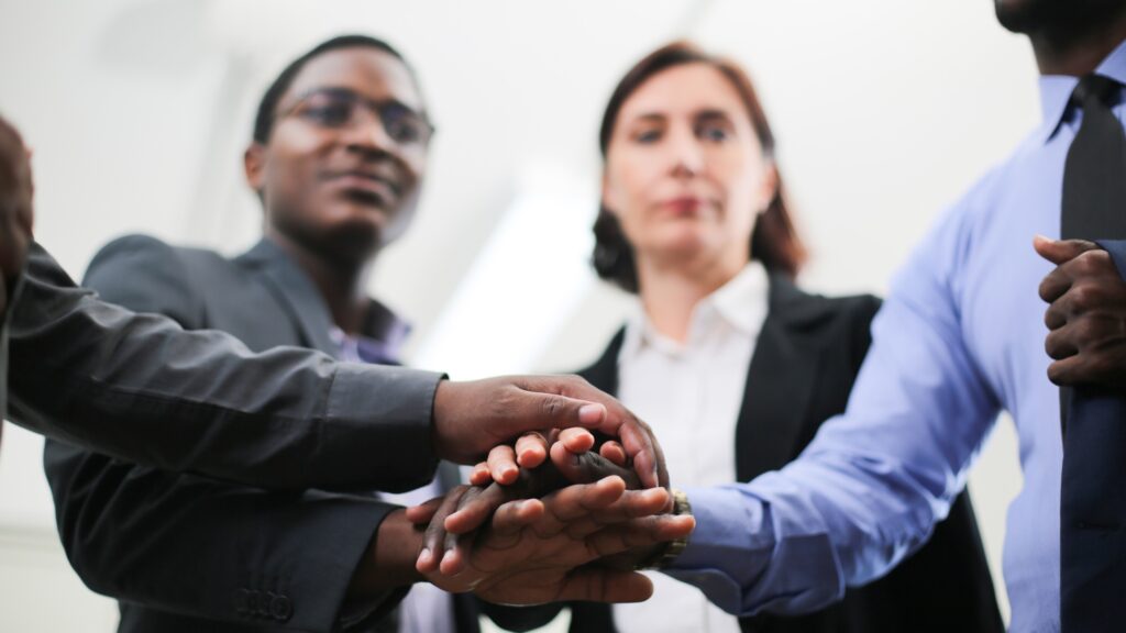 Diverse People Hands Together Partnership